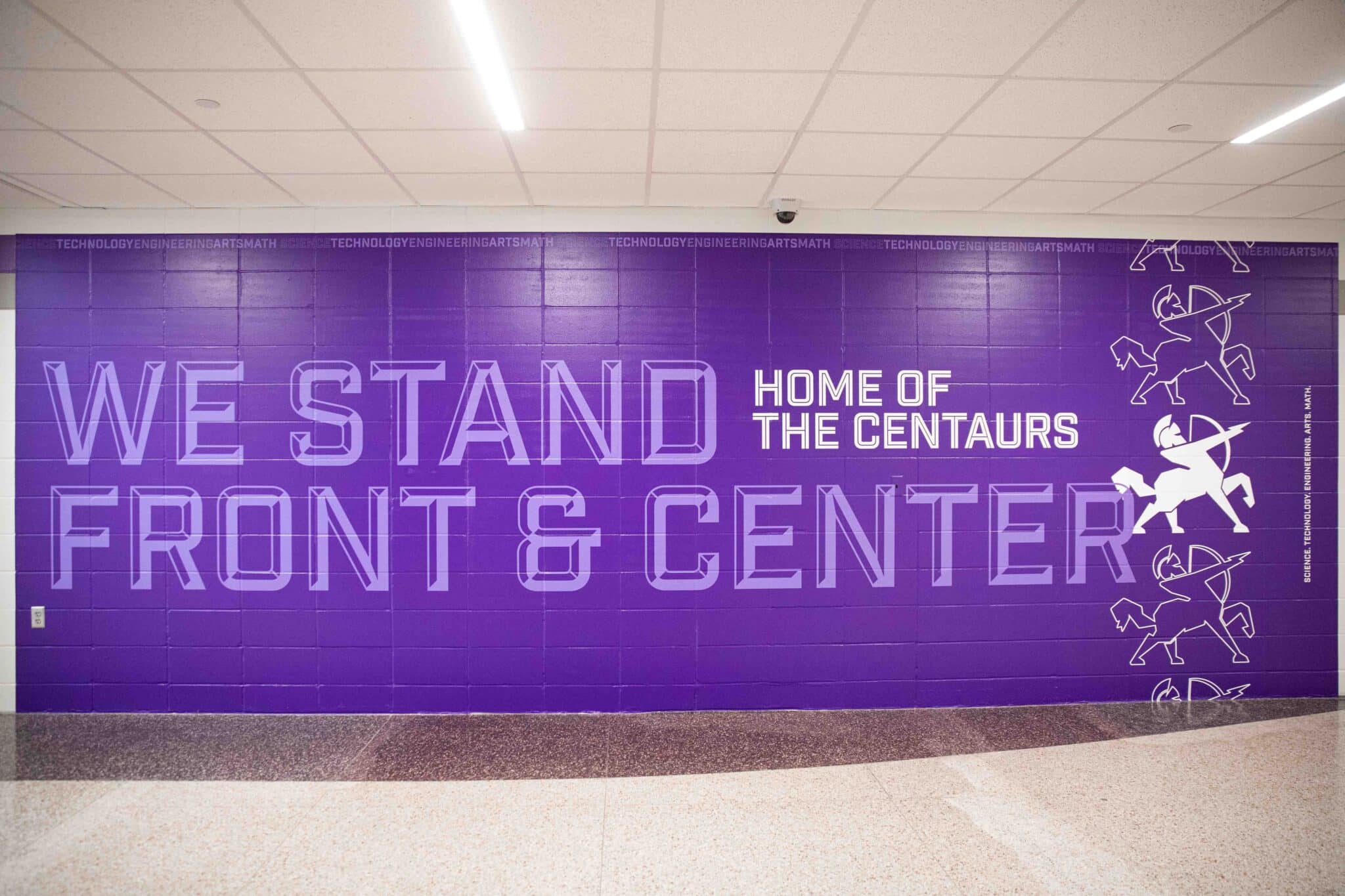 we stand front and center wall graphic installation